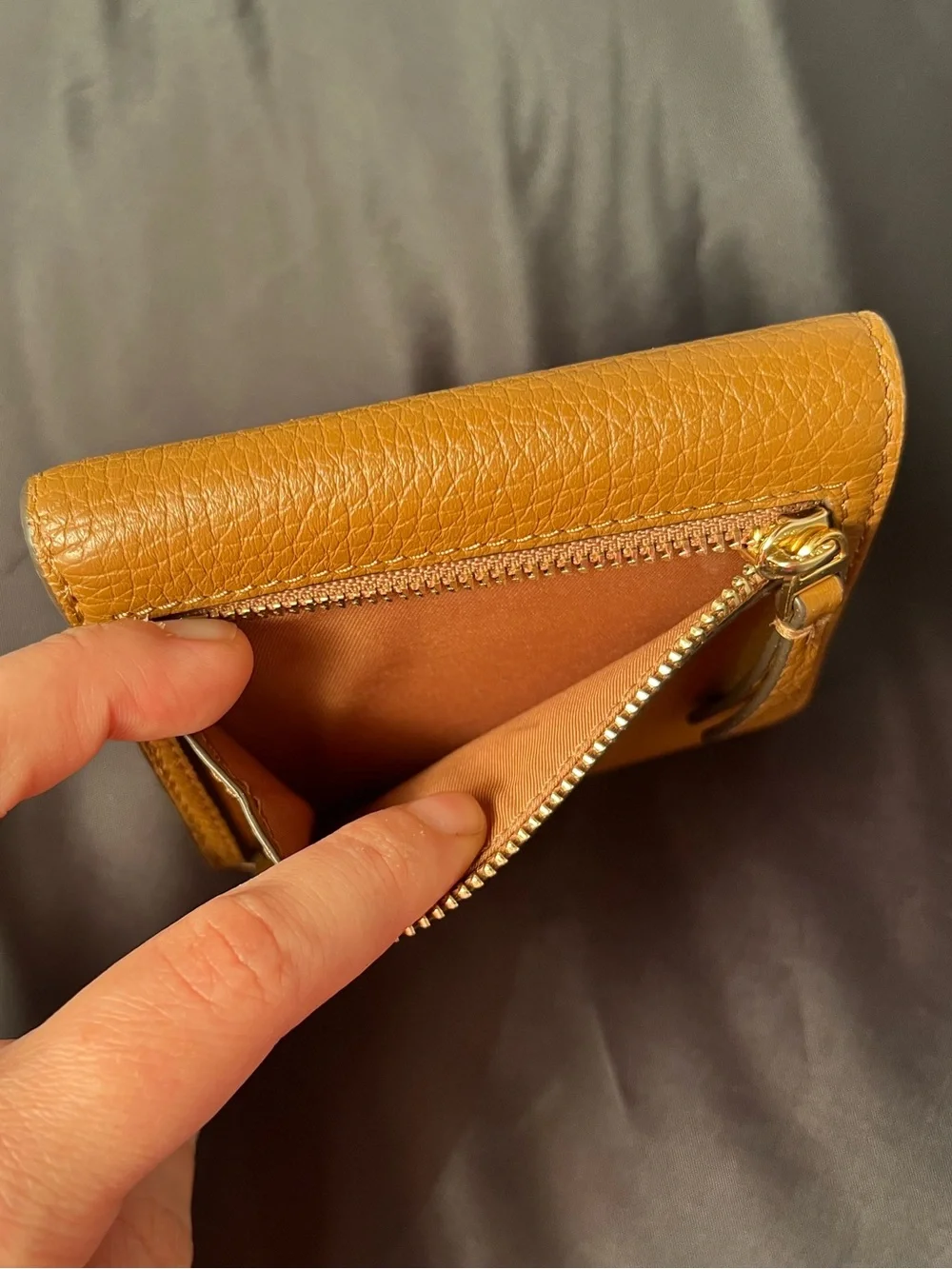 Tory Burch Britten Brown Moose Pebbled Leather Tri-Fold Wallet 4” L x 3.75” W